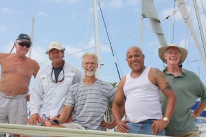 Happy crew about to leave Shelter Bay: Tim, David (friend assisting with line handling), Zeke, "Gato" (hired line handler), Bill.