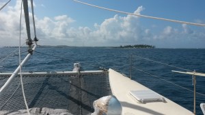 Approaching Porvenir in San Blas Islands.  Round thing in foreground is a drifter buoy that we will be deploying in the Pacific.