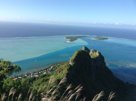 Bob climbed to the summit and took this photo. We're anchored to the left; one other boat came in, further right. Between the two islands is the channel to the pass through the reef.