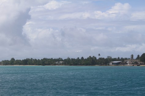 It's hard to photograph scenery at an atoll, since it is all flat. Here's the plane taking off -- three flights a week.