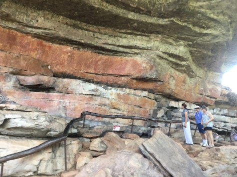 There are paintings all along this wall.