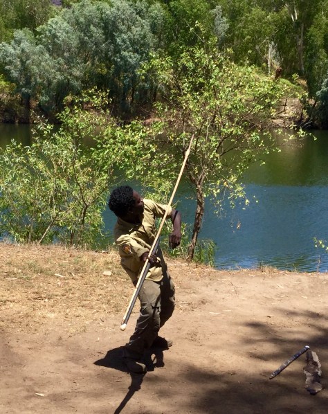 Spear throwing with a woomera (similar to an atlatl).