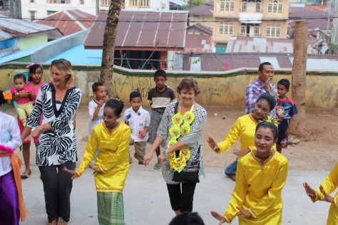 Back outside, the music comes up and the guests are invited to join the dancers. Klaudia and Janet represent the BPO well.