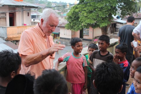 Tim struggles to get the noisemaker clacker-balls going.