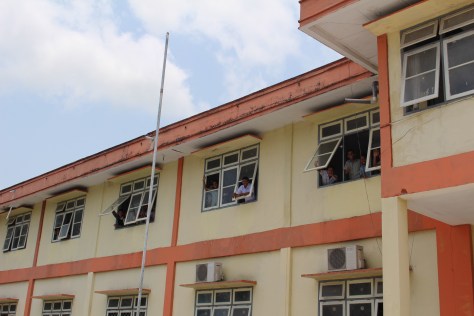 We are spotted as we approach the school.