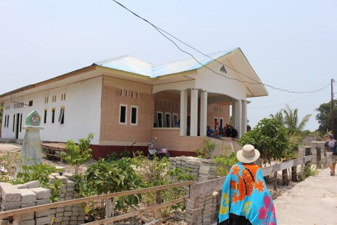 ...to the island leader's house...