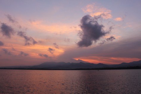 As we approach our destination in the morning we clearly see the band of ash from the volcano, streaming to the right, and bound for our deck...