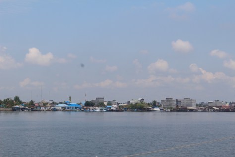 Kumai. Note the gray concrete structures -- giant bird houses...