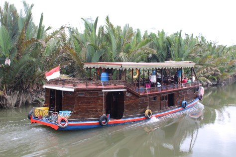 Up the river we go, in company with Chapter Two's tour boat