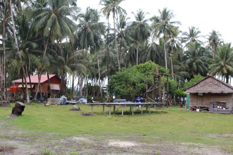 Sooli's solar array (mounted horizontal since we're at the equator), and to the right his old tsunami tower, new one about to be built
