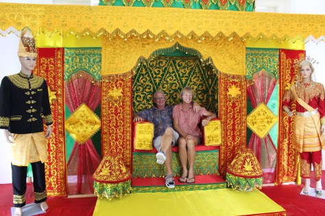 Rob and Carol renew their vows at the traditional marriage alter at the local museum.