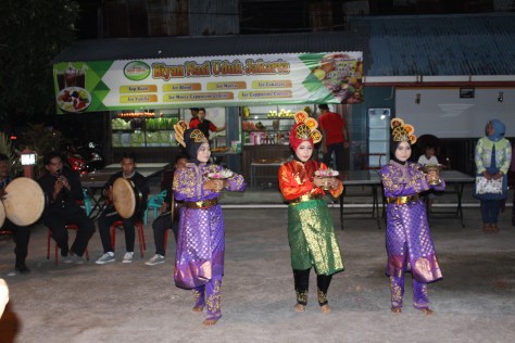 Our official welcome. They offered us little wrapped-in-a-leaf packets that we were told to eat. The contained a beetle nut -- almost impossible to chew/swallow!