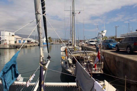 In Le Port, on the wall behind Maggie