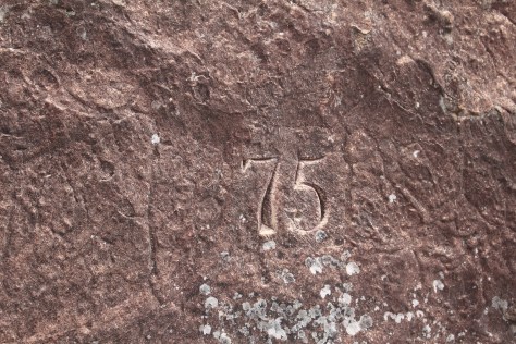 The 75th Regiment was encamped here, charged with blowing up passes used by the Bushmen and others with their cattle. The cook was apparently bored, and carved this 75 into the rock.