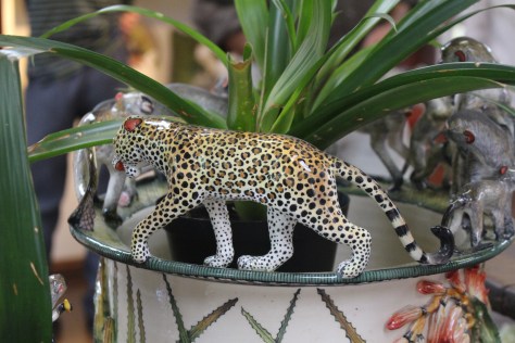 One of my favorites, for the way the art works with the plant held by the piece.