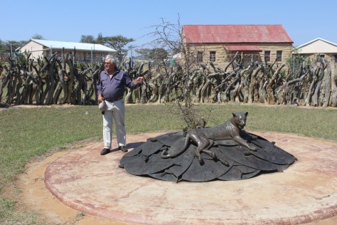 Greg explains the symbolism of a memorial to the many Zulus killed at Rorke's Drift.