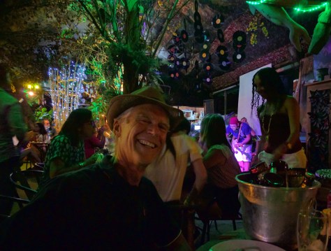 Out for dinner at a bar with Rob, Carol and Liam (oh, another of his photos). Between the language barrier and the din of the band, it was an adventure trying to order food, but we got by and had a fun time.