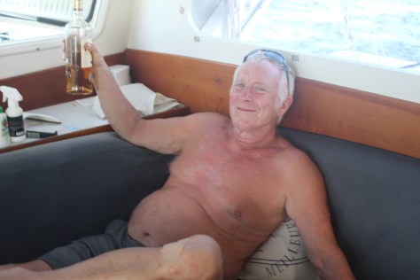 Having cleaned and bandaged his wound, Tim administers some medicine.